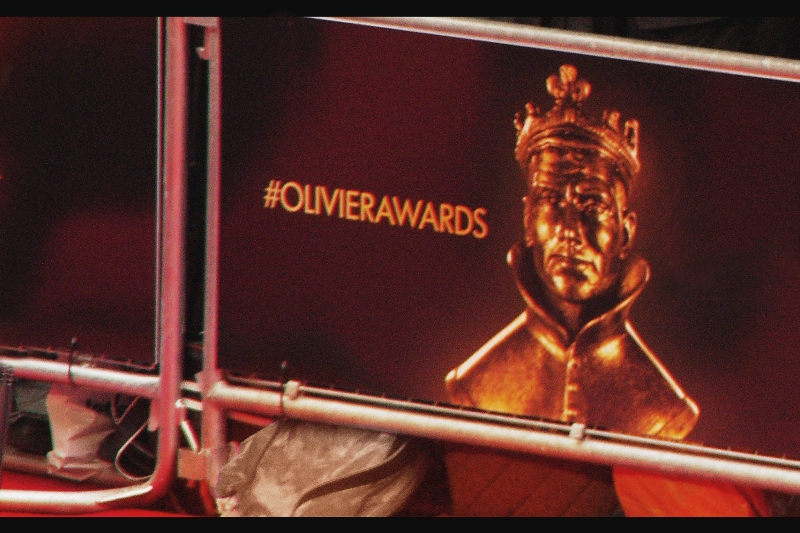 #AngryMascot. Actually, I'd like to think that due to my tireless campaigning over the past two years to draw attention to the intimidating nature of Sir Laurence Olivier's statue, the face on this year's award seems slightly more benign. (You're welcome, worthy recipients!)
