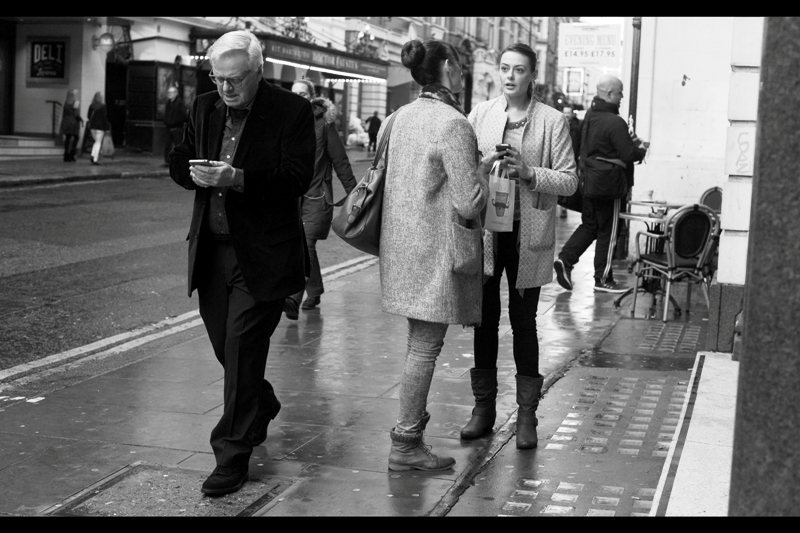 "I still can't figure this Instagram thing out..." I'm given to understand that the man at left is possibly one of the financeers of this production. How do I know? He's just been approached by a nearby autograph hunter who appears to know what's going on.