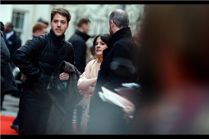 "Weather's turned a bit. You think the flashes from the paparazzi might warm me up?"