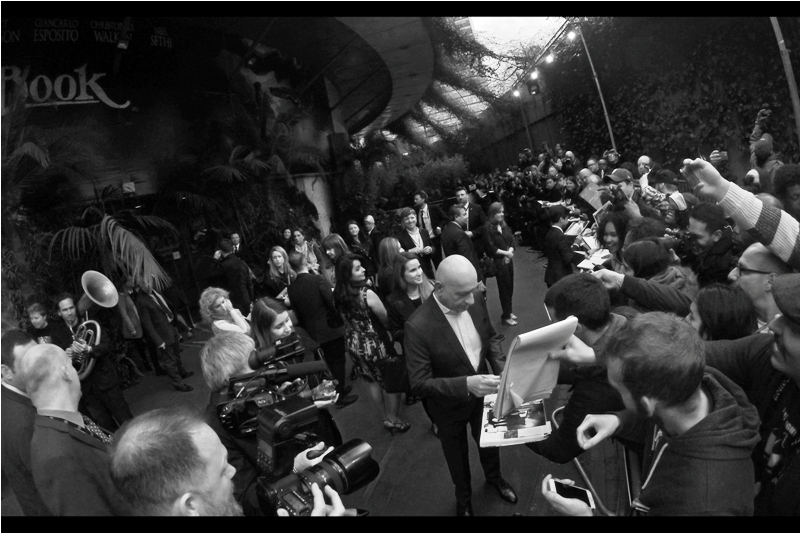 "Fine, I'll sign.... not sure why you're all photographing me doing it, though"