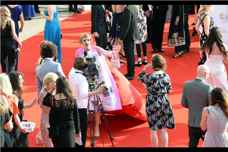 "One day I look forward to having people not questioning what I'm wearing. They'd better still ask me WHO I'm wearing, though. I've got commercial endorsements to think about..." (edited to add : this is somebody called Grayson Perry. It doesn't help me as I don't know who that is)
