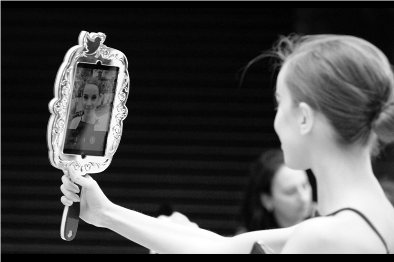 Our enterprising heroine has found another reflective surface and an angle...
