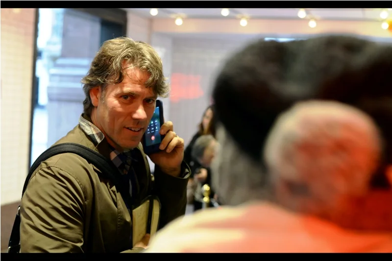T-Minus one hour. There is a brief flurry of excitement as this gentleman arrives and is harangued into signing some autographs by Dealers in the crowd more knowledgeable about his identity than I. He's not in the film, though.