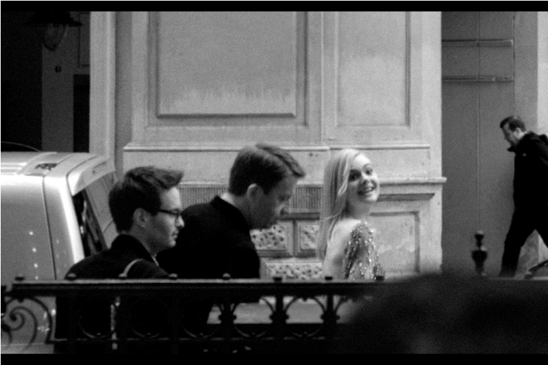 Timestamp 18:31:44 . With apologies to that most venerable company, I wouldn't ordinarily post a blurry shot from my Nikon (Pentax - sure, that's de rigeur) but this is the first photo of the first arrival from the movie : actress Elle Fanning.