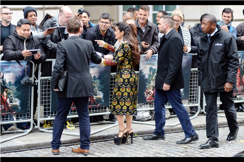 "I''ll have you know this dress was once a famous 15th Century tapestry hanging in the main chamber of a very devout Abbott. Although the high-heels are of a more contemporary design....."