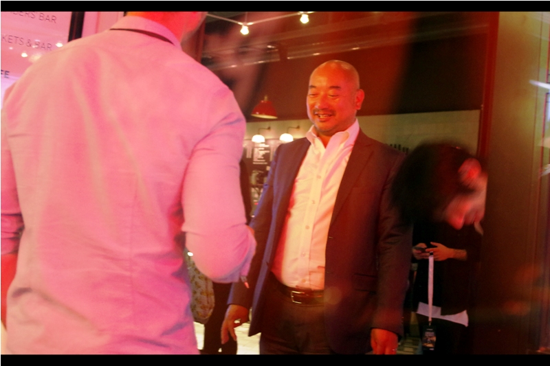 "You're photographing me simply on suspicion of being famous because I look Japanese? Well that's pretty frikkin' racist.... but I am also flattered"