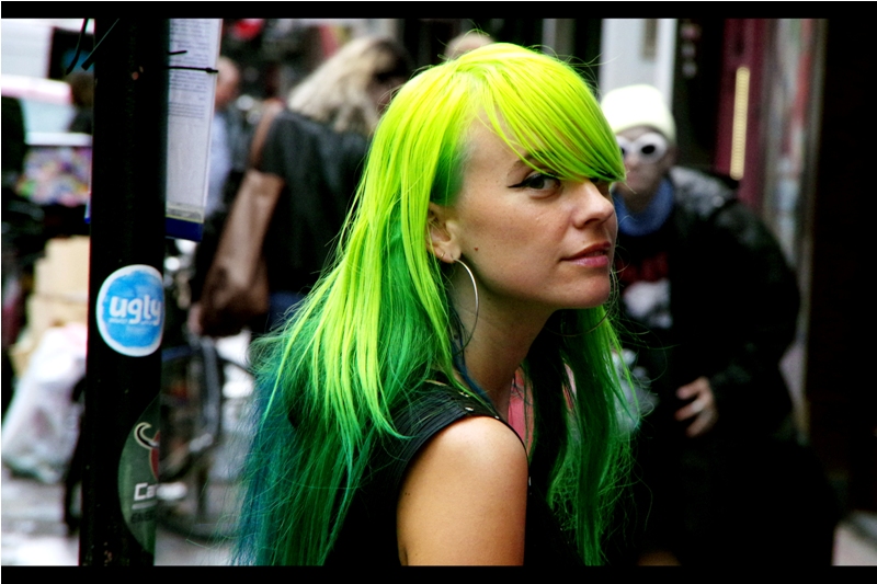 "Hard though it may be to believe, this is my hair's natural colour" . Yeah, maybe, but those giant hoop earrings are sadly being outshone by it.