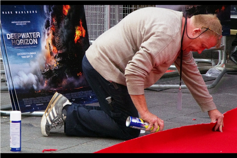 "I probably shouldn'ta put my a55 right there in front of that poster...". 