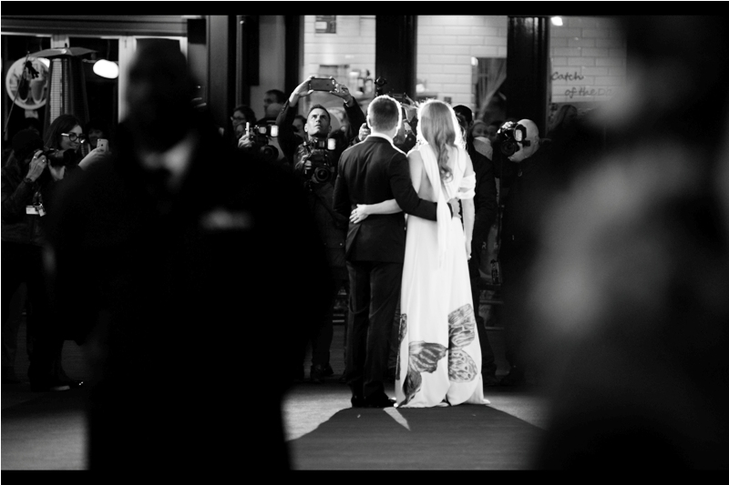"Hold it! Hold it!" "Haven't you got the photo yet?" "Oh, I took it ages ago. I just want to keep looking at you guys while you're standing here"