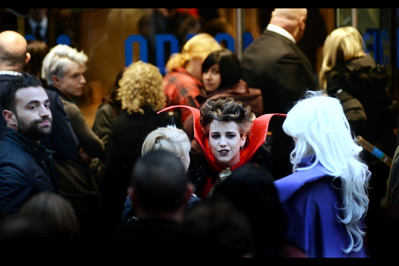"This cosplay is frikkin AWESOME... do I look like I give a crap about peoples' eyeballs or whether I'm blocking this screen?" somebody from the queue of people going in to see the film. (and perhaps see the stars present it...?)