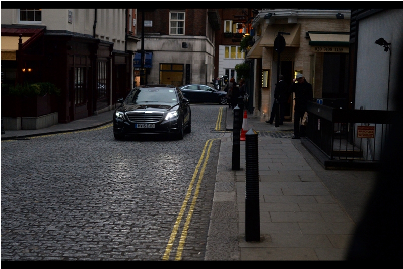 But hark, which light through yonder cobblestone driveway shows? It is a Merc, and stars are the contents. (Either that, or it's just the locals going out for champagne for their butlers or caviars for their cats or something)