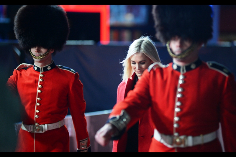"I left my compact back in the limo but I'm too embarrassed to get my armed guard to turn around. I'm guessing The Queen wouldn't think twice..." - our host and interviewer for the night arrives.