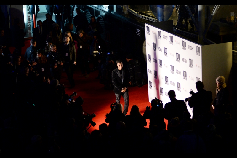 Our first arrival is wearing what appears to be a black jacket and a neat hairstyle .... and at this distance I can't make out much else.