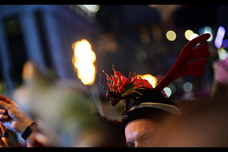 Don't look now, but one of the fantastic beasts is on that man's hat.
