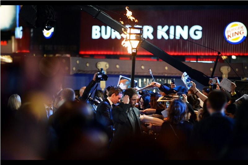 And before you could say "where's the freeness??" the event started. To the deafening screams of the 90% female crowd around, lead actor Eddie Redmayne arrives, and the King of Burgers gets a rare product placement in one of these journals.