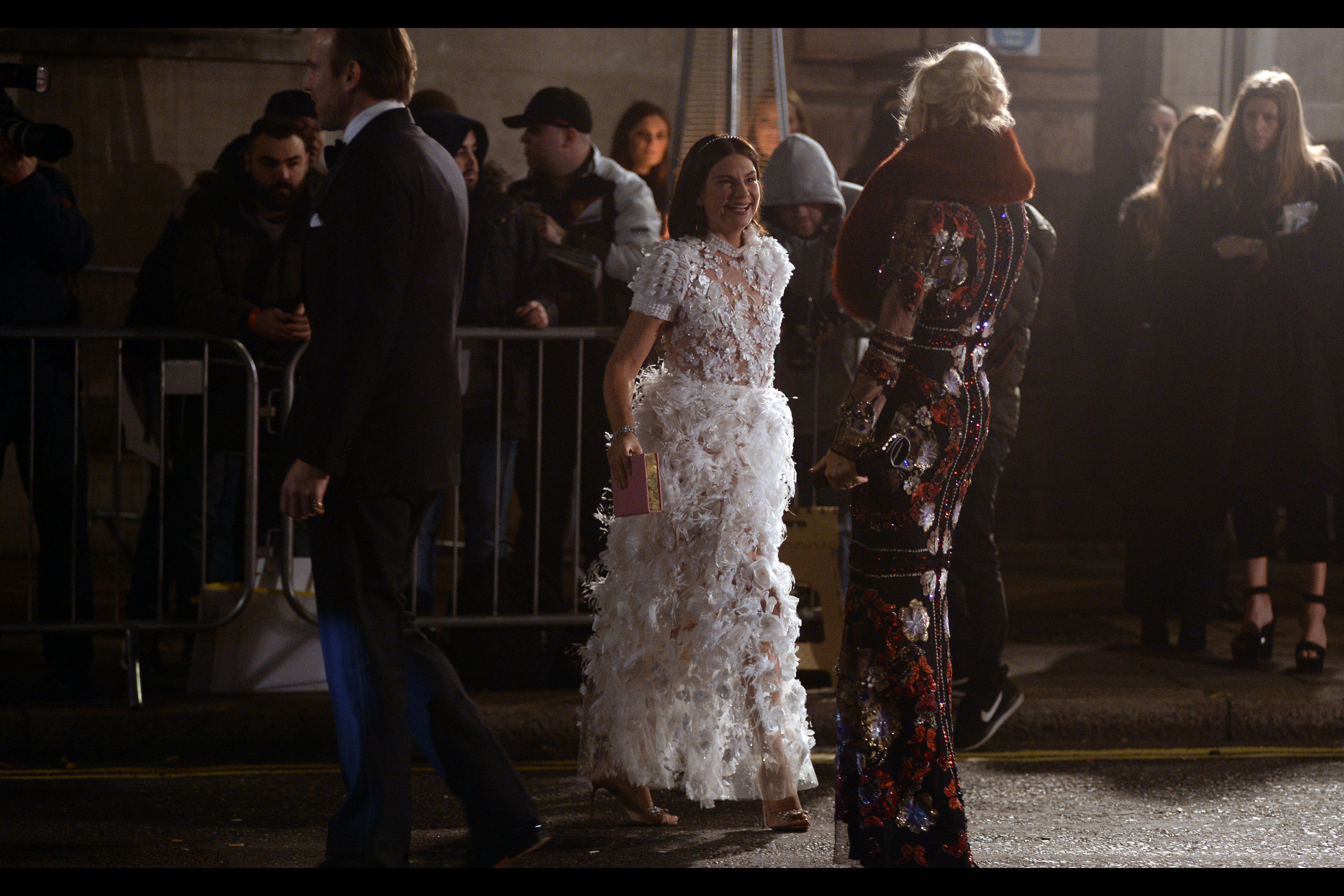 In what might become a running theme for tonight, I have no idea who this is. Or why they'd kill so many baby birds to make that dress. (edited to ad : Natalie Massenet) (additionally edited to add : who?)