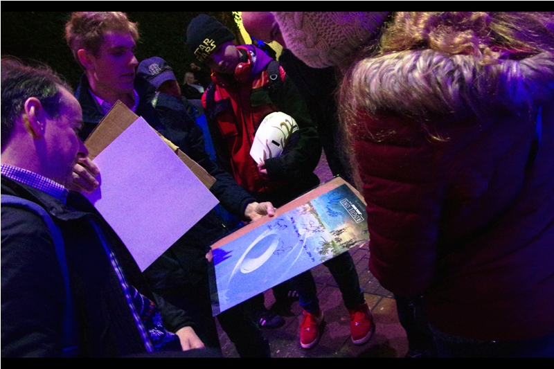 "So… if none of the people on the poster show up, how about you guys sign it, since you're here?"