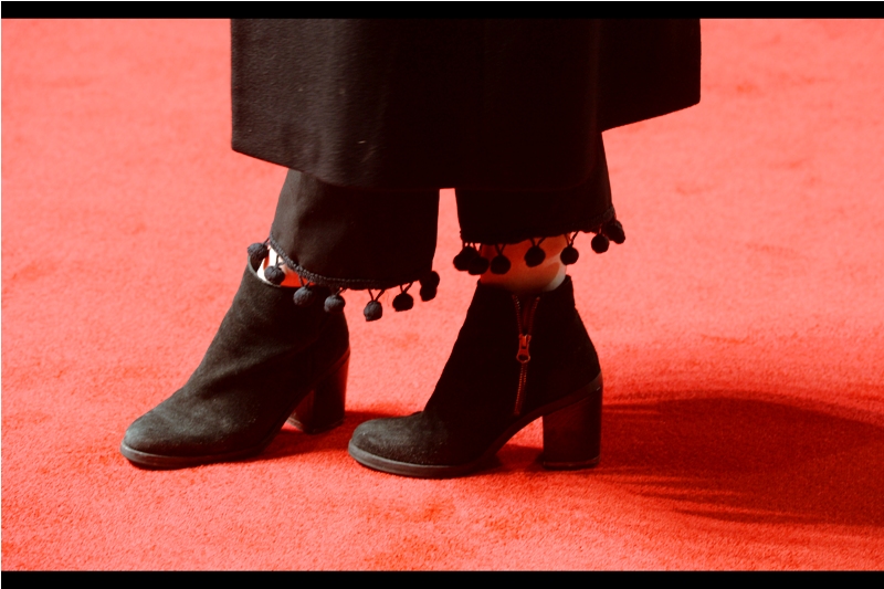 As previously noted (and posted about for the last four days) London Fashion Week is on right now. So just for now I'm actually noticing little things like miniature pompoms hanging off the bottom of trousers worn under a dress/jacket.
