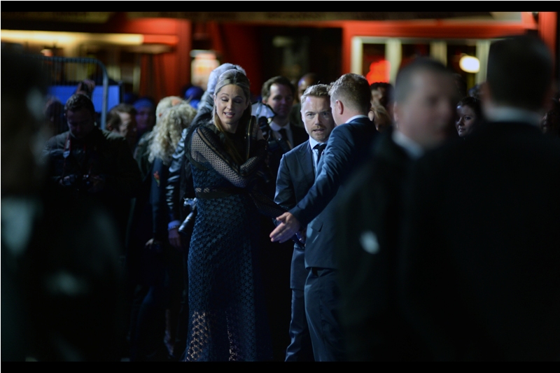 "The screaming is mostly coming from over there, from three or four women. And possibly one high-pitched dude" - the reason for the majority of people in the crowd being here is Ronan Keating, who is both a singer and the lead in this film.