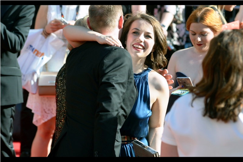I also don't know who this is, but "people hugging people at awards shows" is also a genre of picture that has some payoff, as long-lost castmates who might have worked together (last year perhaps, or yesterday) see each other for the first time (in months, or twelve hours perhaps).