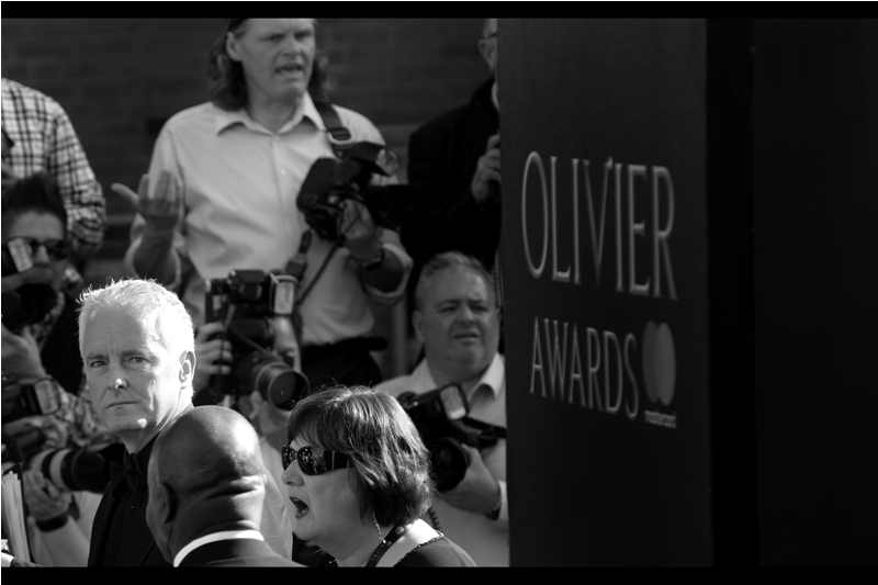 I don't know who this man is, but his expression is SERIOUS. And that's what theatre is : SERIOUS. Some of the paparazzi in the press cordon even wore TIES to this event, while I wore a baseball cap with a shiny LA on it. It stands for (I) L ove A ll (Things Related To Theatre).
