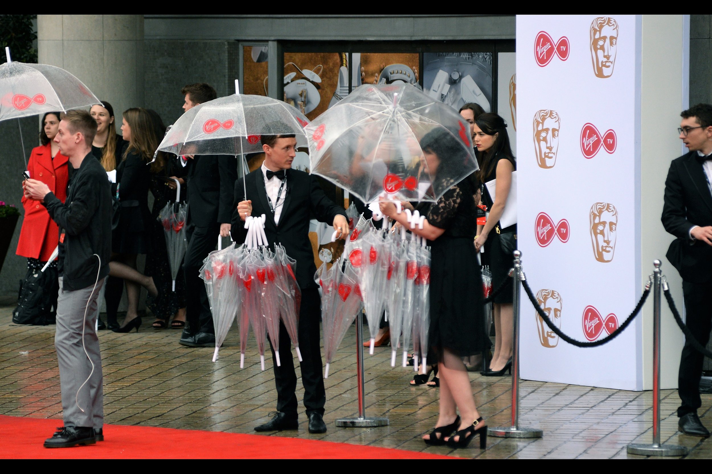 "No, Denise, You can't 'make a mint' selling umbrellas to 'loaded A- and B- listers'. That's not how this works. Maybe you can angle for a generous tip - MAYBE - but that's all"