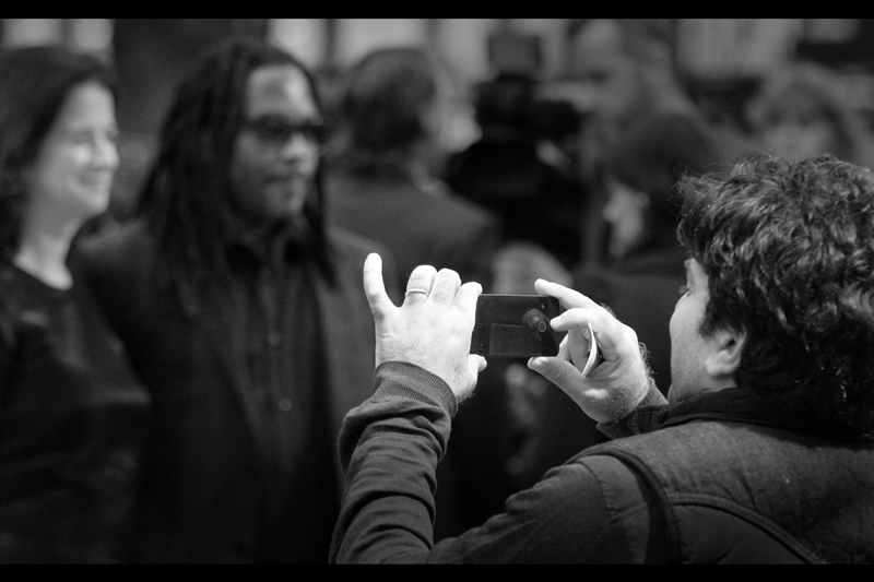 "Wait... I'm not even sure this phone takes film. Can you keep posing while I figure this out?"