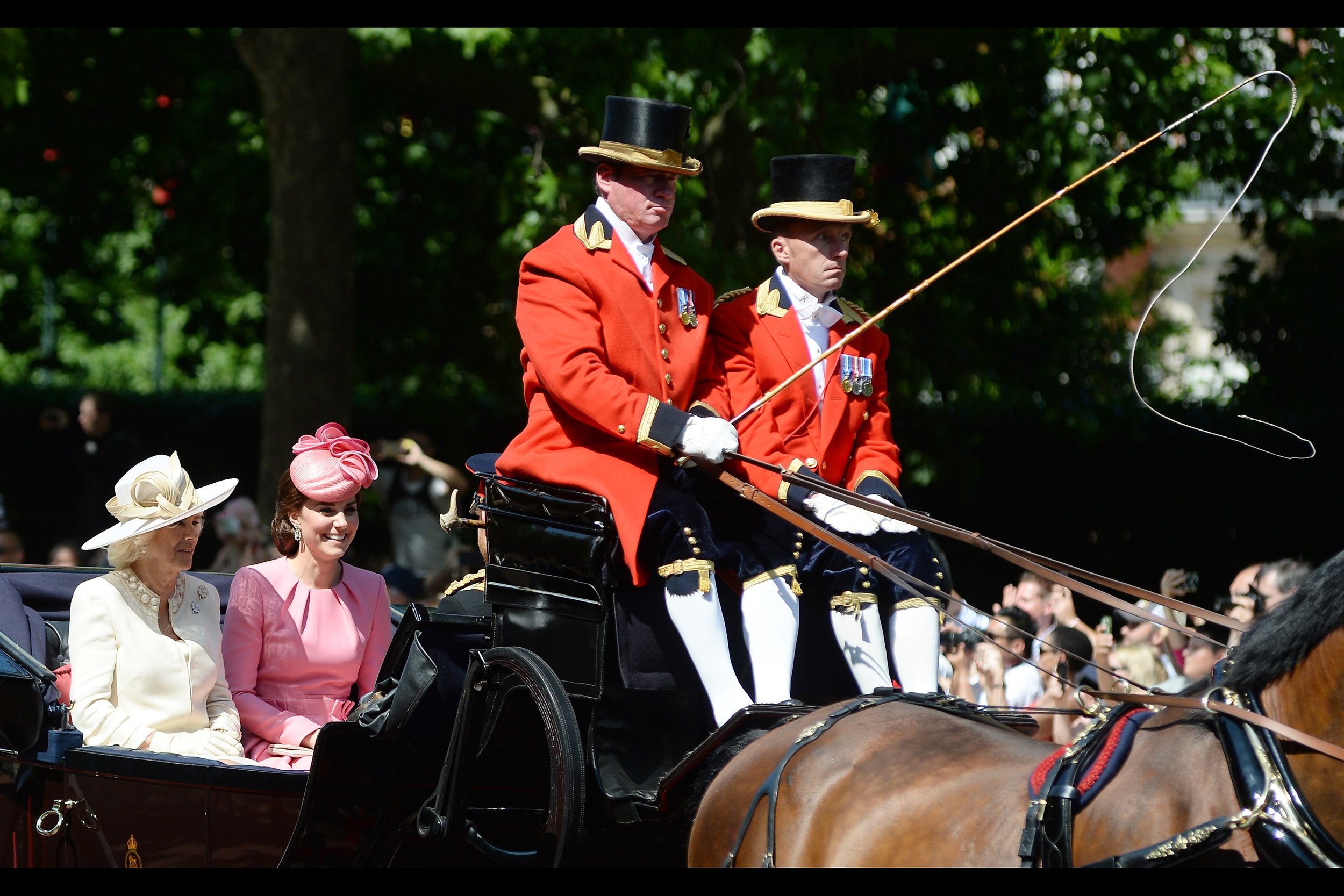 "None of them even bothered to co-ordinate their clothing. Don't make eye-contact with them, Dear." - The Duchess of Cornwall (left) and Duchess of Cambridge (right).