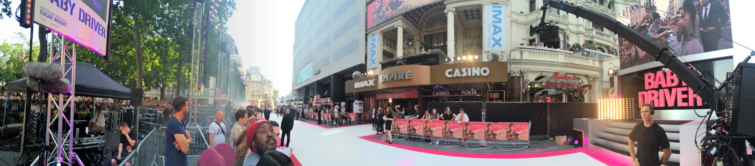 A white and pink carpet, a position in almost full sun, and event organisers providing free bottled water to avoid the embarrassment (as against the publicity) of people fainting at the sight of Ansel Elgort. Good times!
