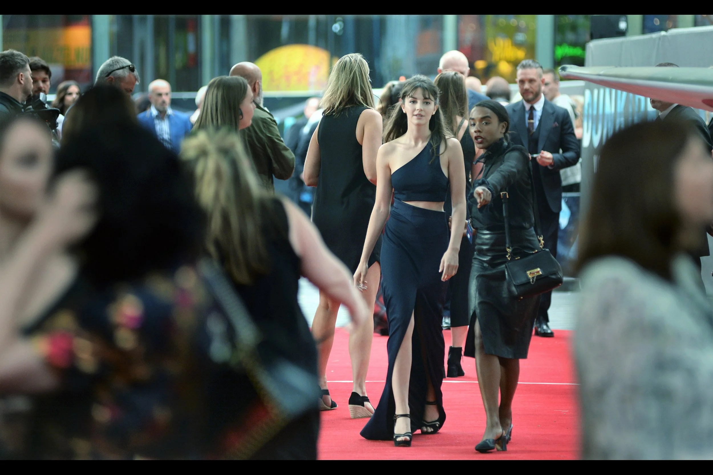 "If you stand there and look around prettily for about, oh, five minutes, you're going to make that dude with the Nikon/Pentax combo over there feel very strange about wanting to photograph two married dudes rather than a pretty girl blocking photos of them"