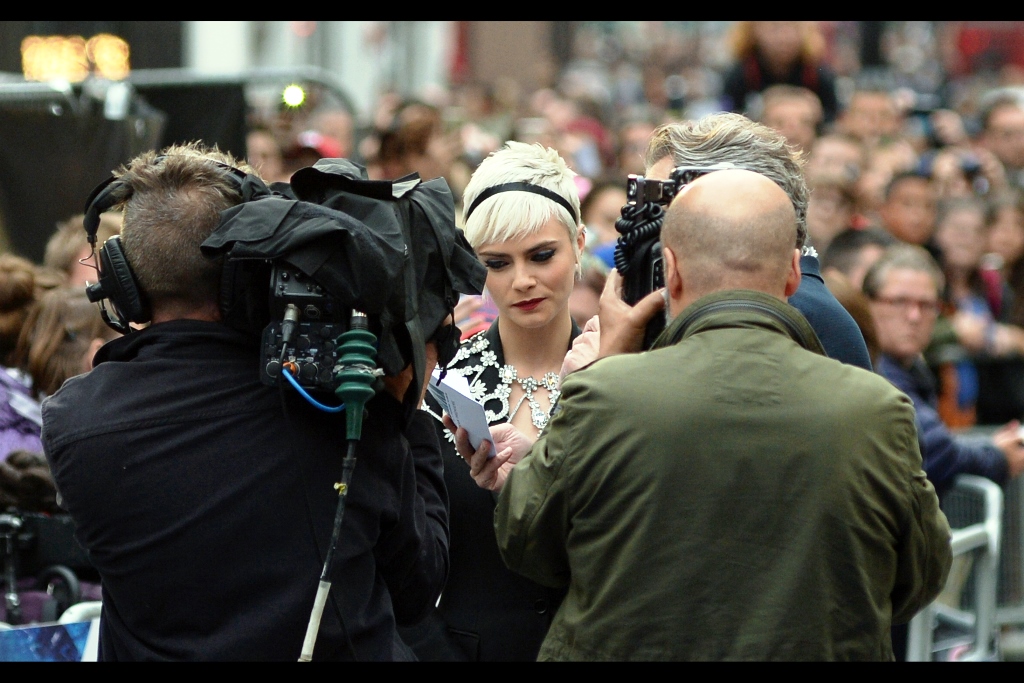 "There's a question from a dude on twitter wanting to ask you on a date. And another guy, also from twitter, also wanting to ask you out on a date. We also asked the crowd for questions to ask you and most of them were guys... well, I think you can see a trend" - this movie's lead actress, model Cara Delevingne has arrived