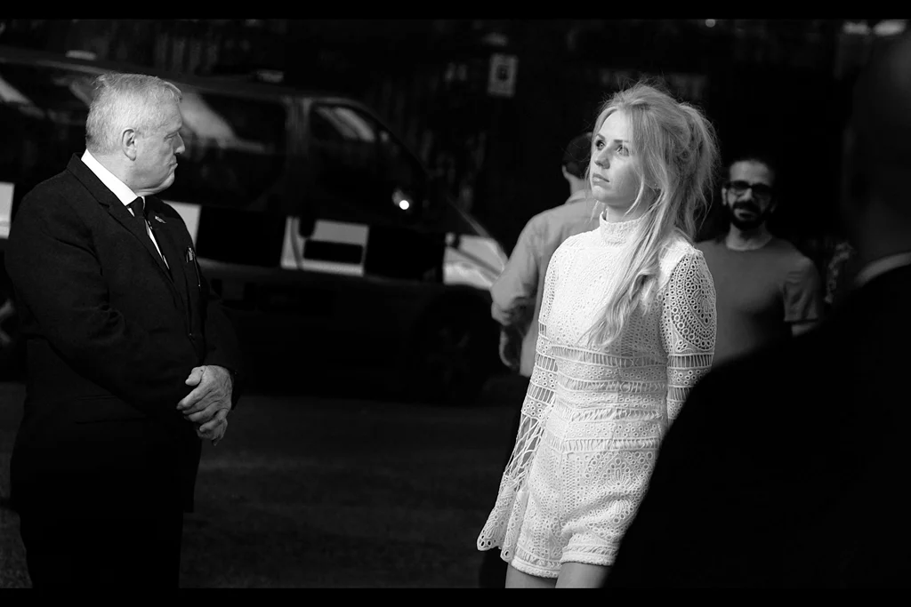 "What exactly are you doing, young lady?" "Standing here pouting prettily hoping you'll let me in to see the movie for free" "Oh" "Well....it usually works. Is it working?" "No"