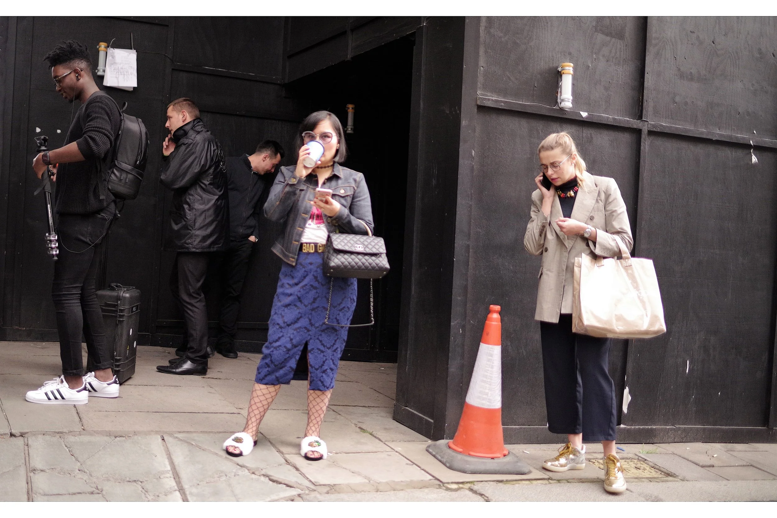I was.... taking a photo of that traffic cone. It's Ironic (,baby). Just like good fashion.