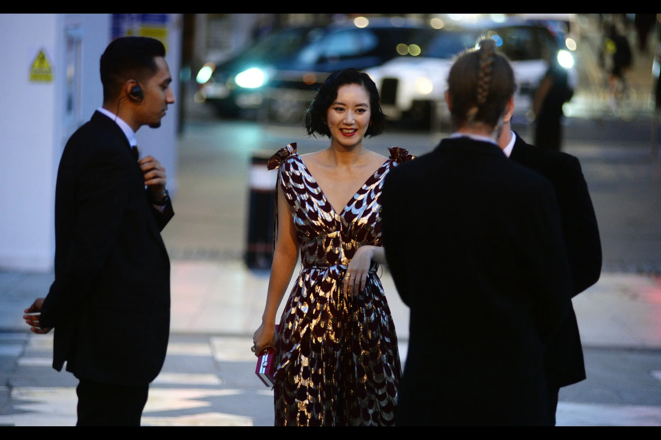 I don't know who this is. But with all the credibility almost a decade of covering London Fashion Week 'streetside' can give me, i will pronounce what she's wearing as.... a Dress..