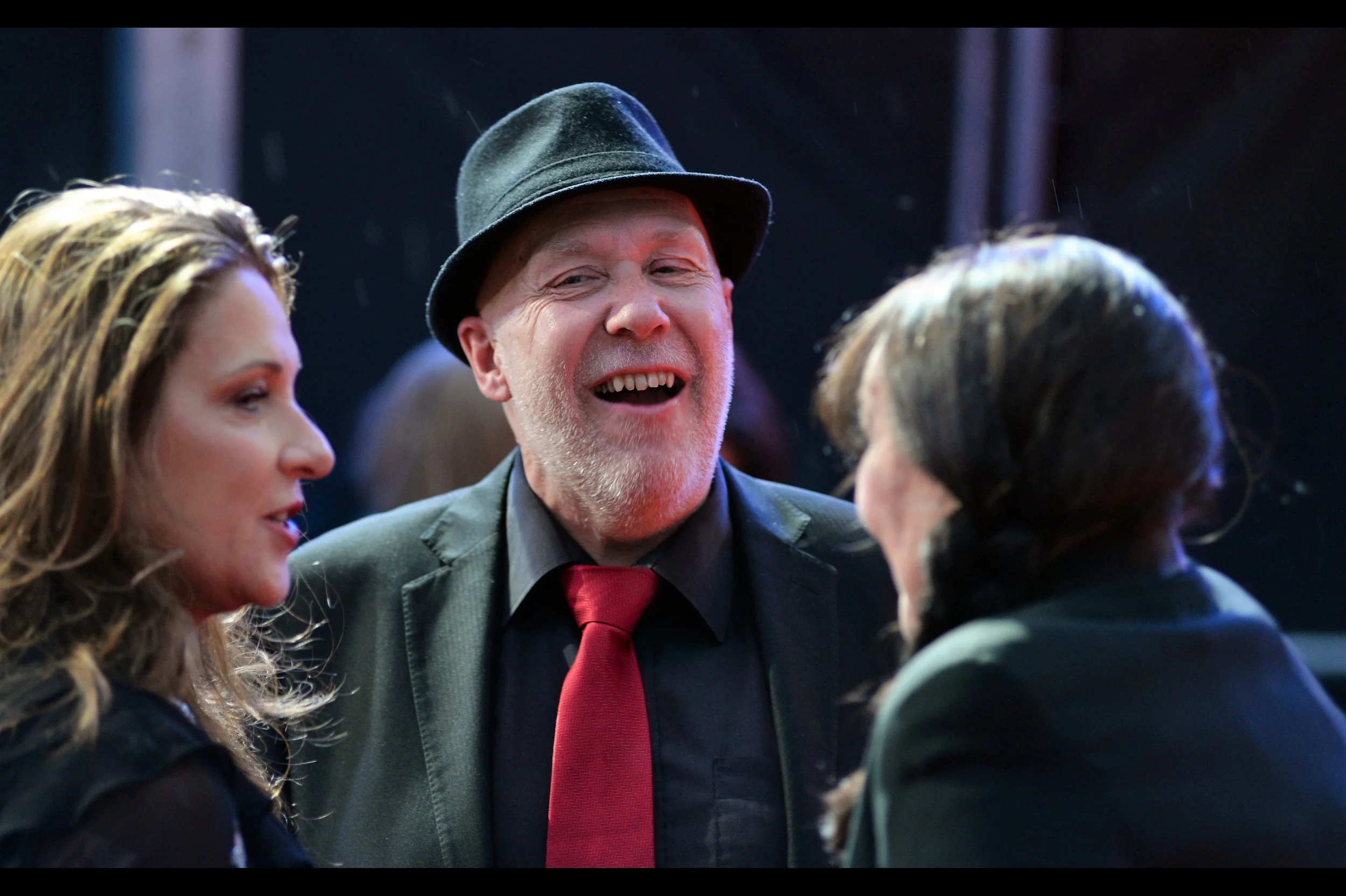 I... don't know who the man in the hat is. And I need sleep more than I need (at this point) to know. I'm sorry. I guess that's why TOPSHOP BLOG has a media pen presence and I'm listening to 'The Martian' soundtrack right now. (edited to add : producer Colin Vaines)