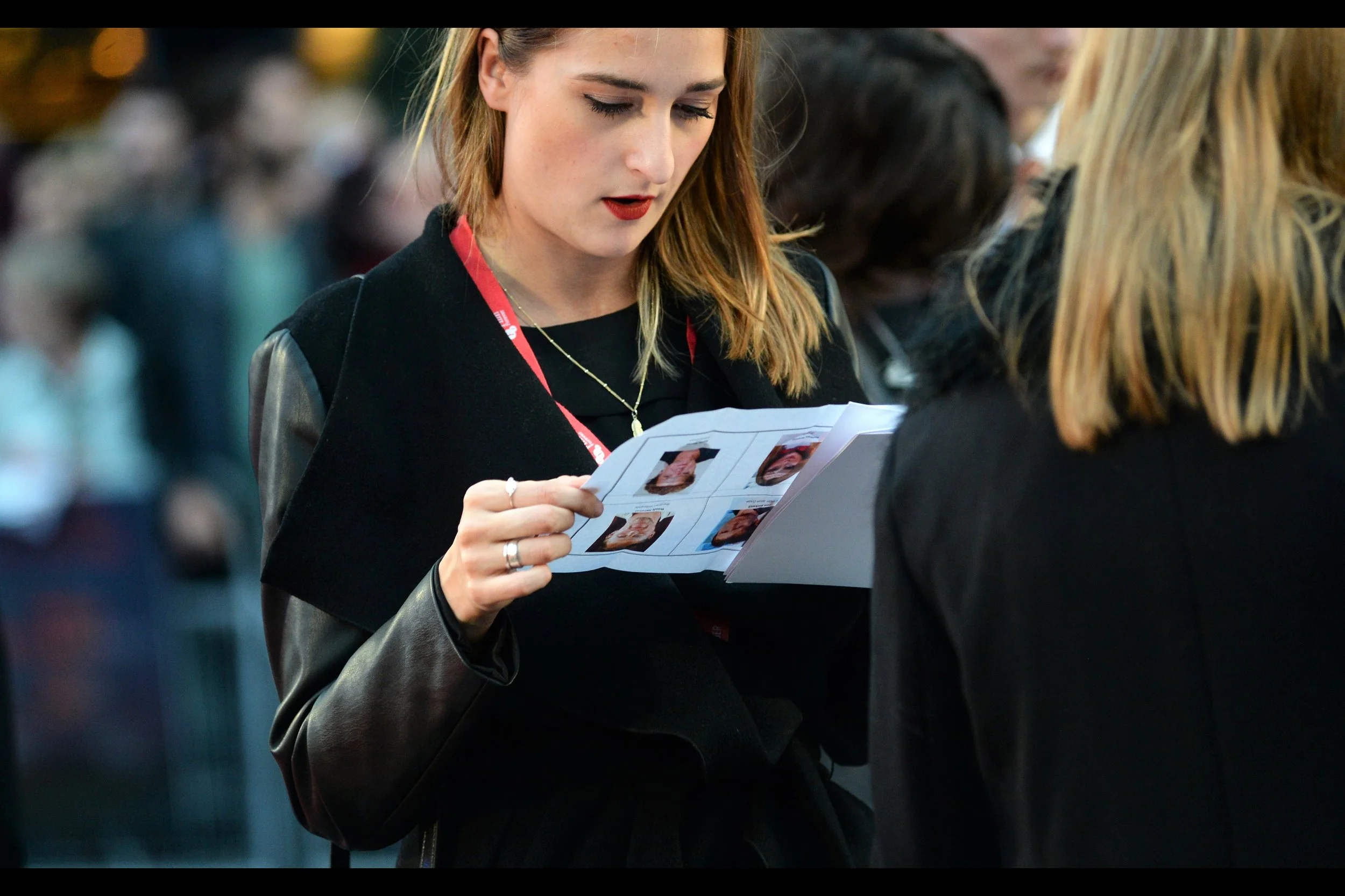 "These people mostly look unfamiliar to me, and not just because I'm looking at them upside-down". The List has more than four names on it... but mine has four. And a tick-mark next to each is what I want from this premiere.