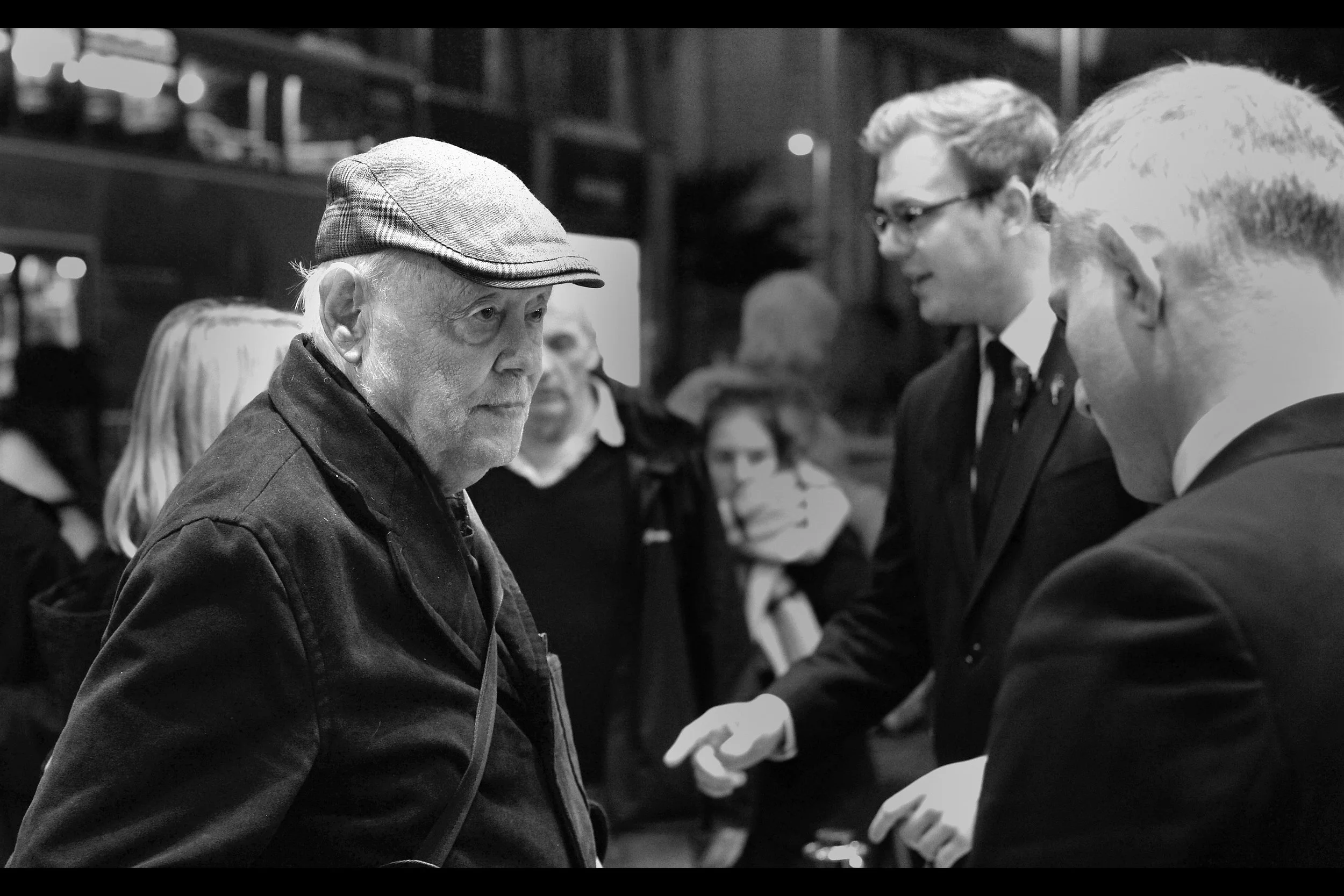 Remarkable catch by a wizard in our pen : this was later identified as Dudley Sutton, who I last photographed at the premiere of "Outside Bet" , where I wrote a comment I'm going to reheat and place right here: "Ordinarily I'd merely comment on the hat and then move on. But my favourite sentence from his wikipedia entry is : "In August 2003, he performed the one-man 'Killing Kittens' show at Edinburgh's Underbelly". " - well played, Me In 2012.