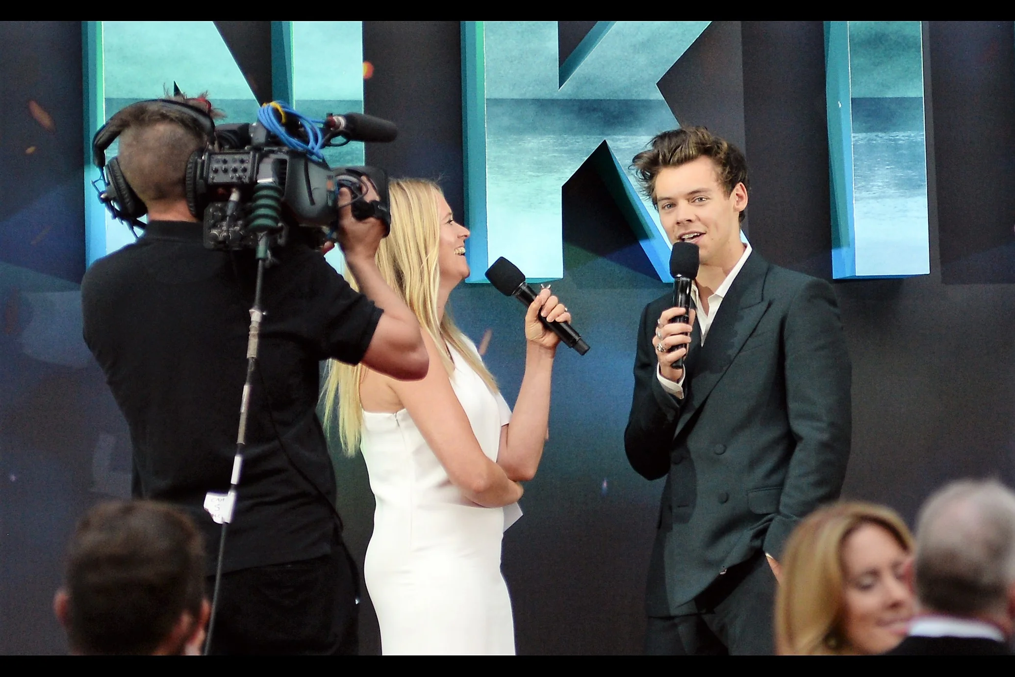 July 13th : Harry Styles wouldn't mind if the screaming stopped for just a few seconds at the "DUNKIRK" World Premiere .