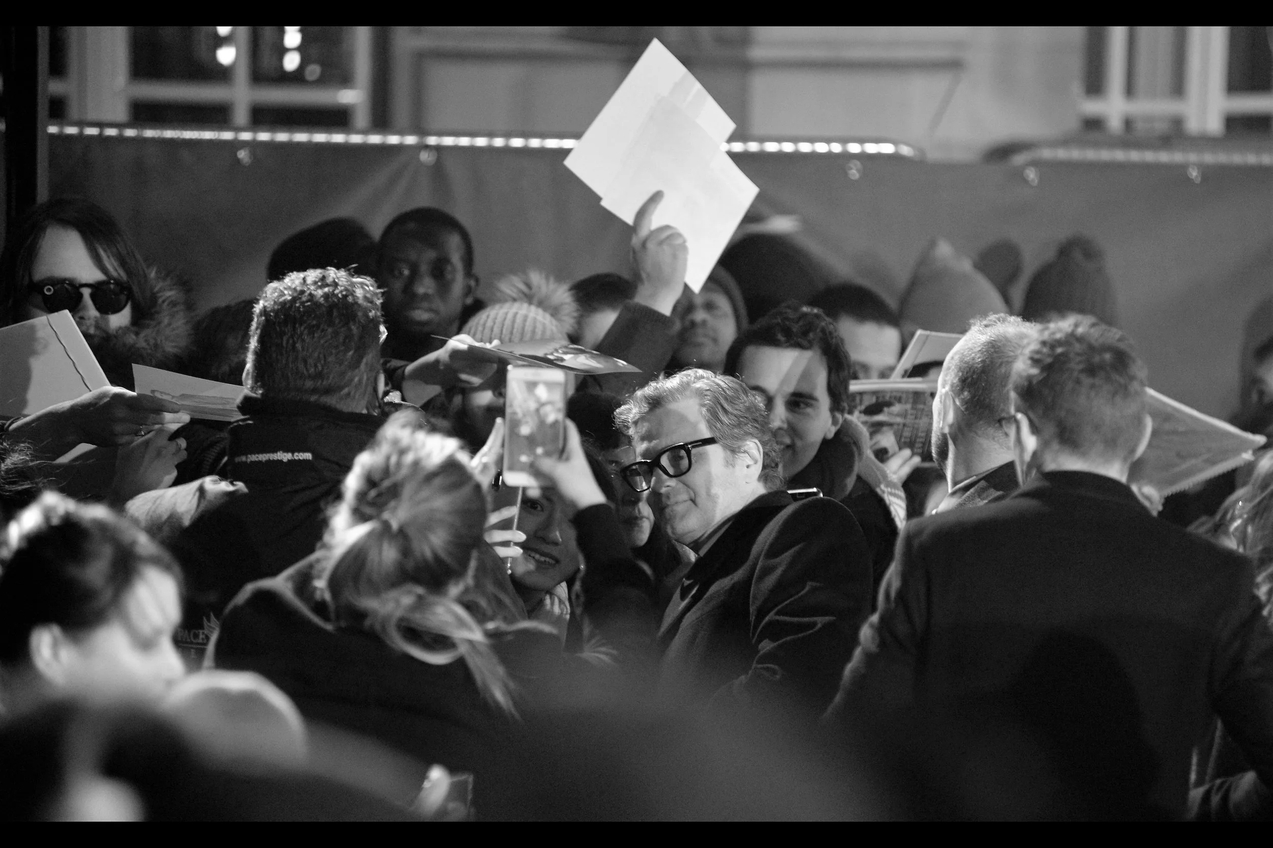 Is that man on the far left wearing sunglasses at night? Are those sheets of paper a spec script for a second Mary Poppins sequel that integrates it into the Marvel Cinematic Universe? Is that phone mounted backwards atop a wire coathanger? Do I remember how to photograph a premiere? All these and more questions are rather confronting and I'd rather not answer.