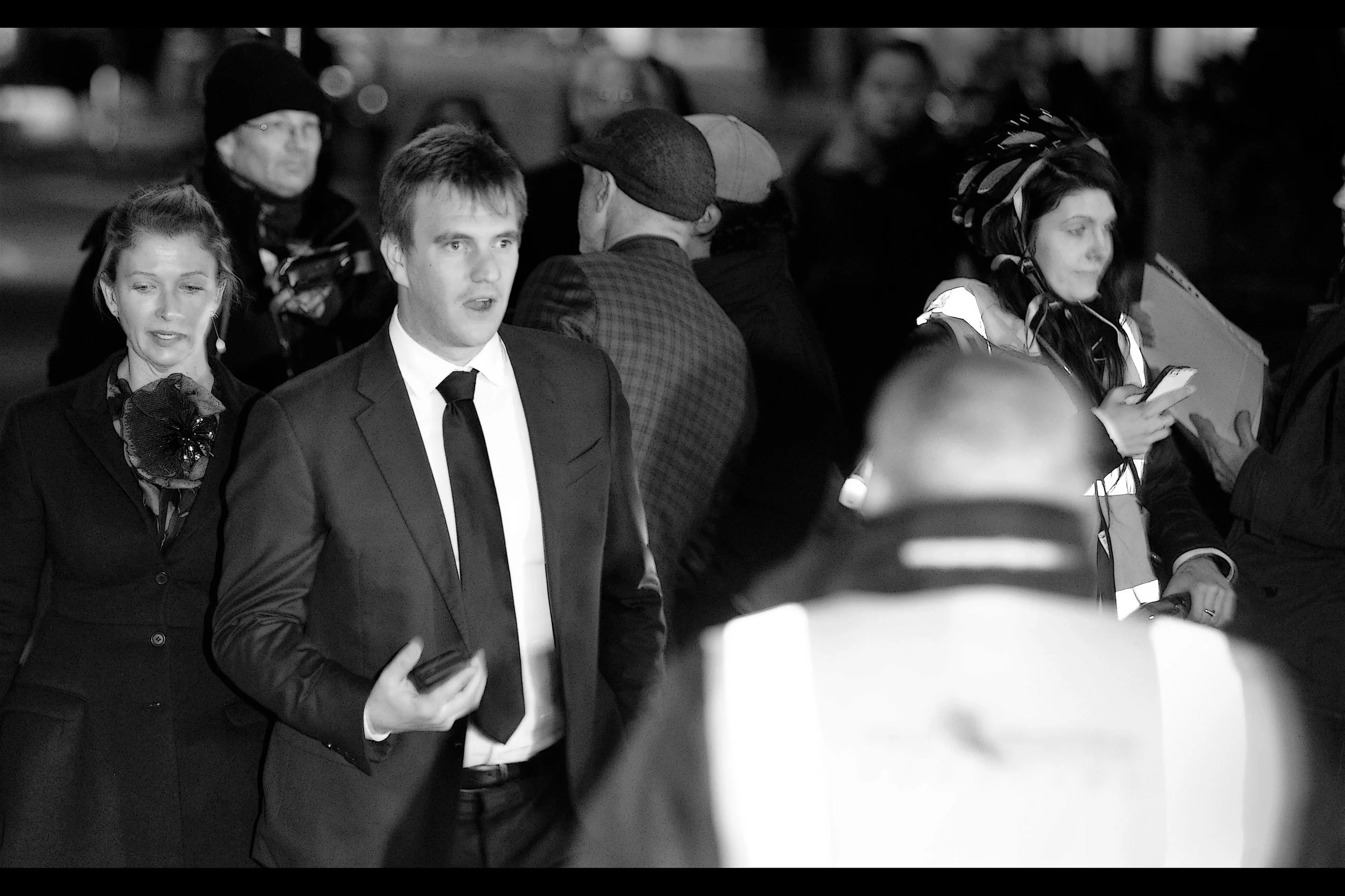"You all came for me? I'm flattered of course. And where's my cappuccino?" . I don't know who this is.