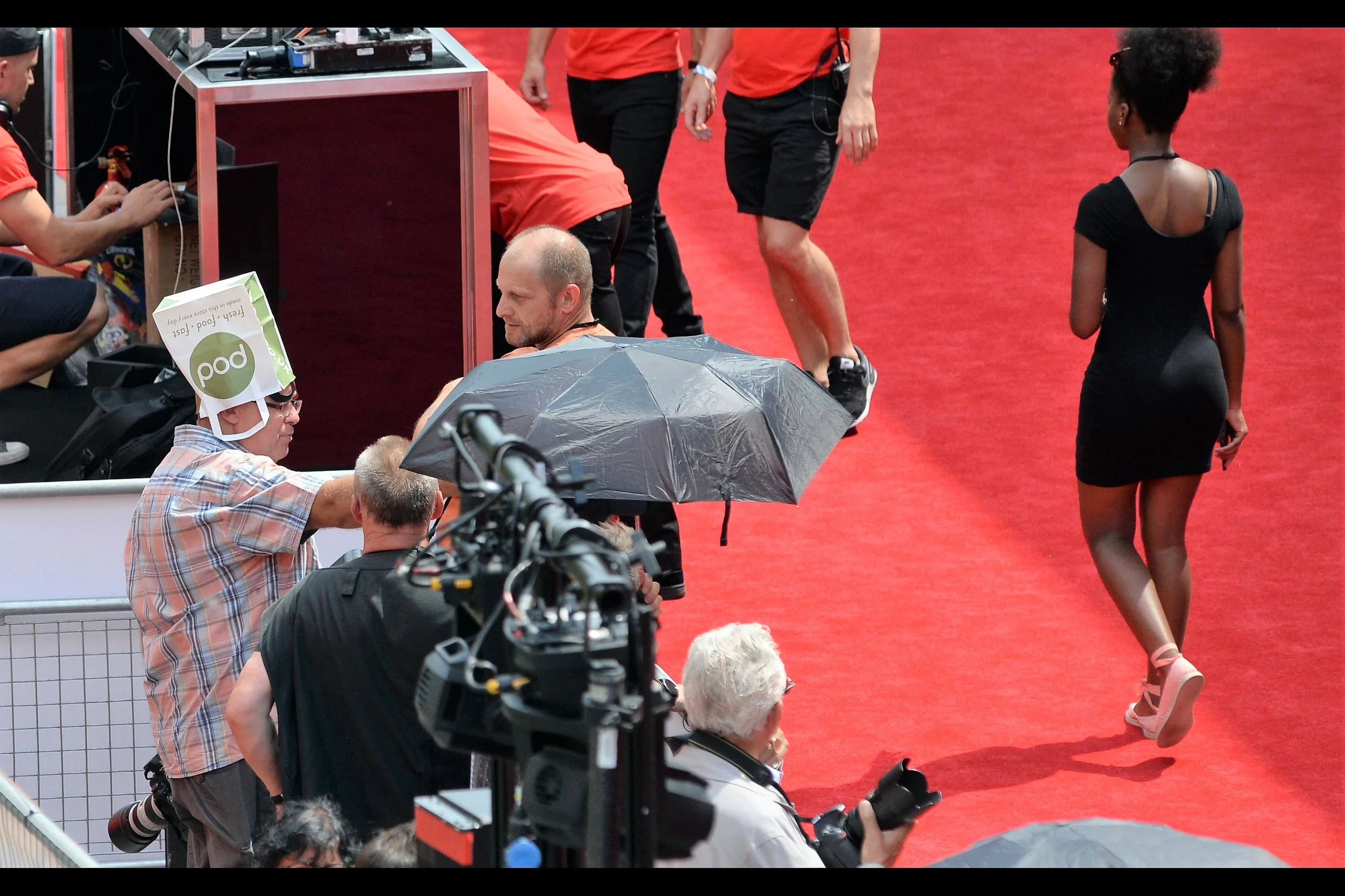 'Pod'-branded paper-bag being used as a hat in London. It'll catch on elsewhere, eventually.