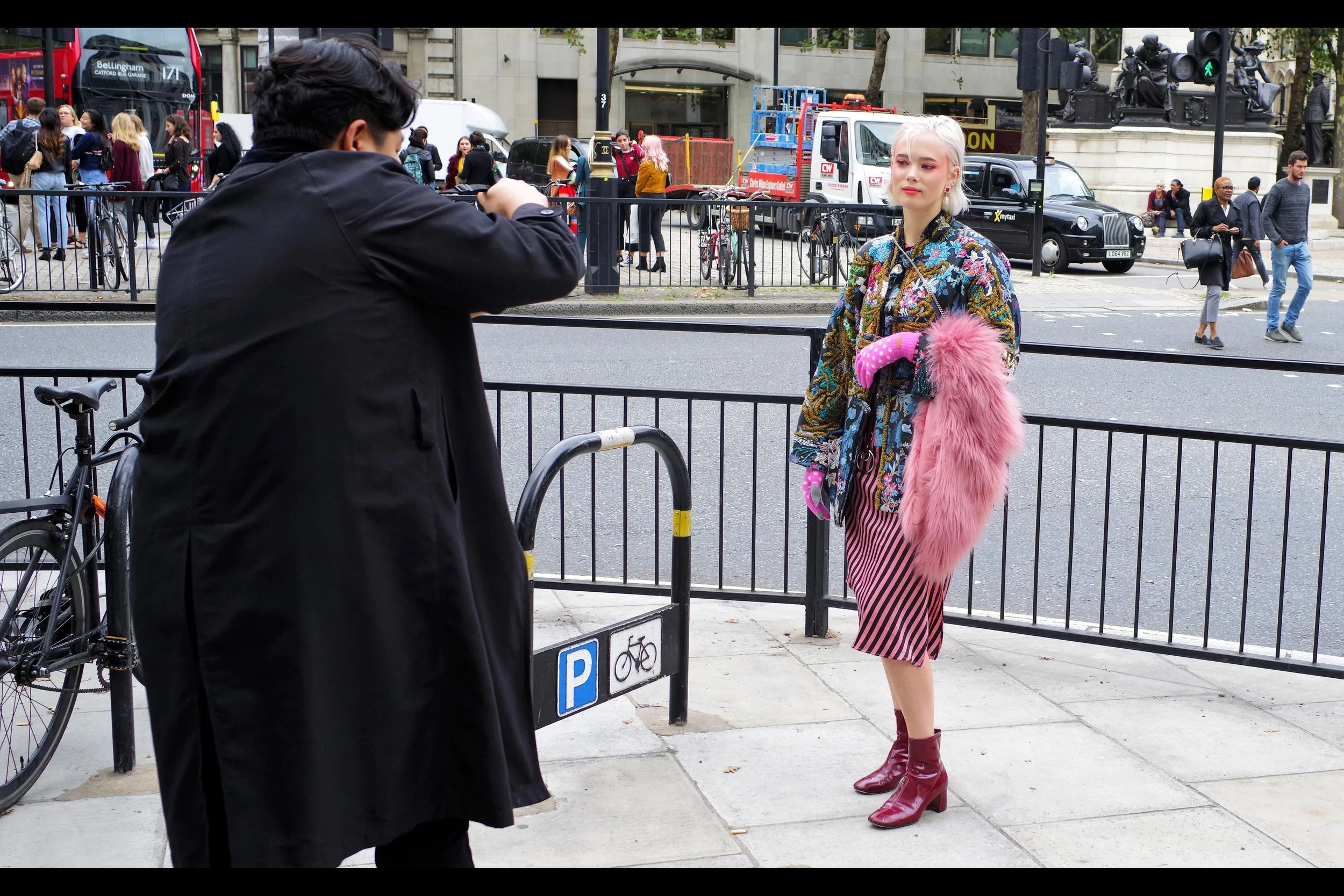 “Ma’am, I’ve been camped out on this precise corner of The Strand since yesterday because it’s the prime spot to photograph removalist trucks driving by. So I don’t care what you’re wearing… GET OUT OF MY WAY!”