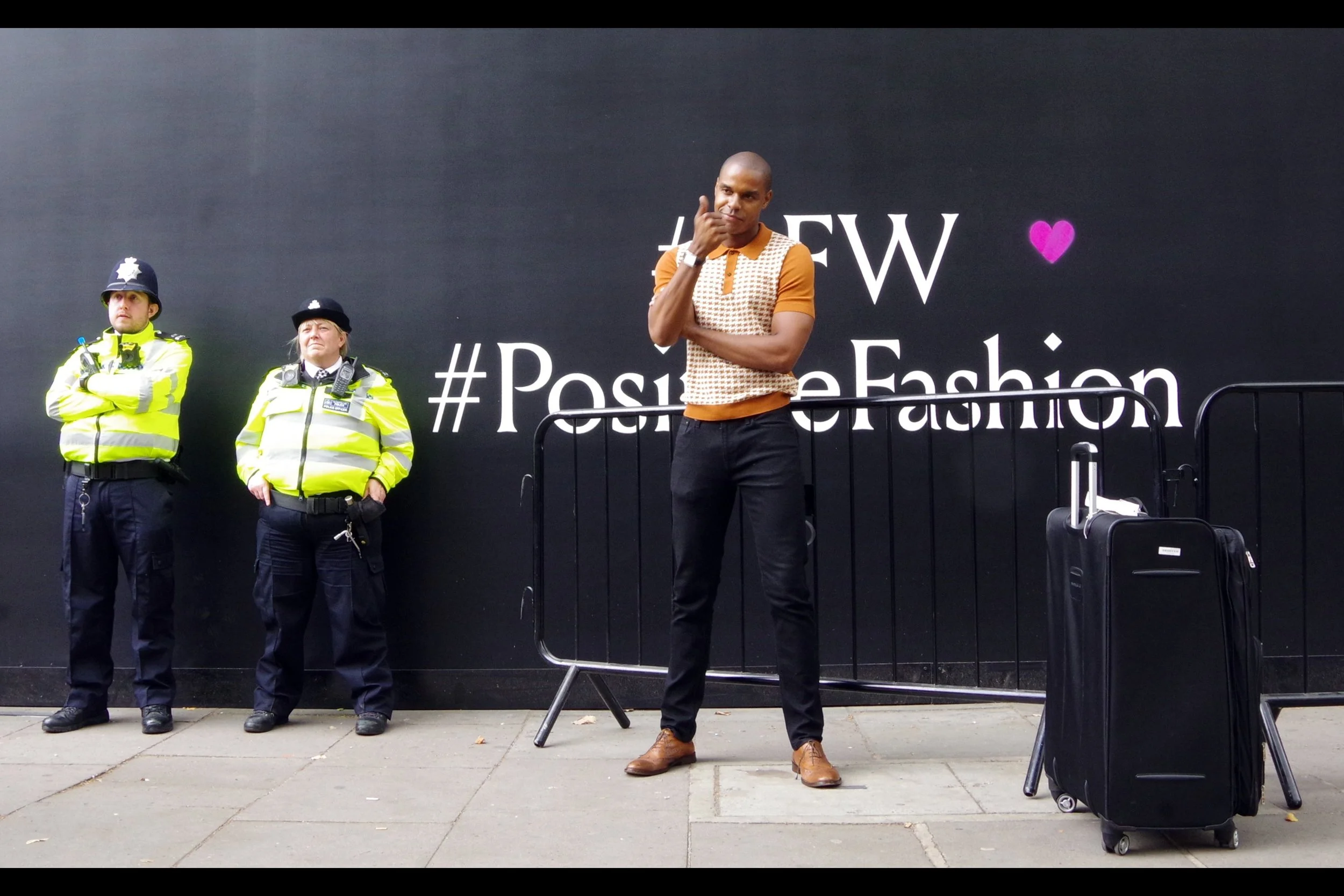 I don’t want to besmirch the talents of Britain’s modelling talent, but of the three people in this photo, I gotta say the guy in the brown shirt only has the second-strongest pose.