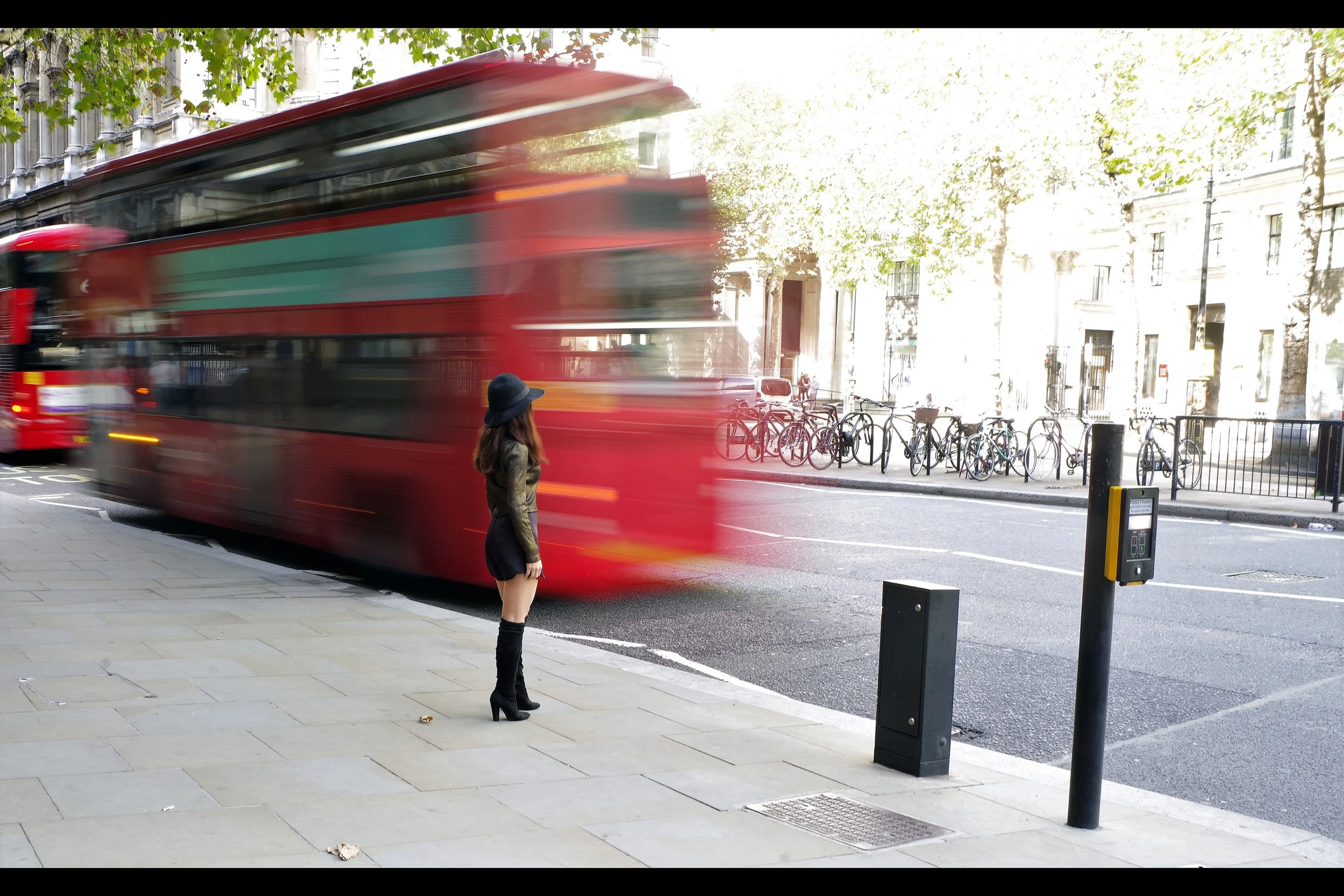 “Every time I dress this nicely, everyone assumes I stand here to be photographed when all I want to do is get the bus home….”