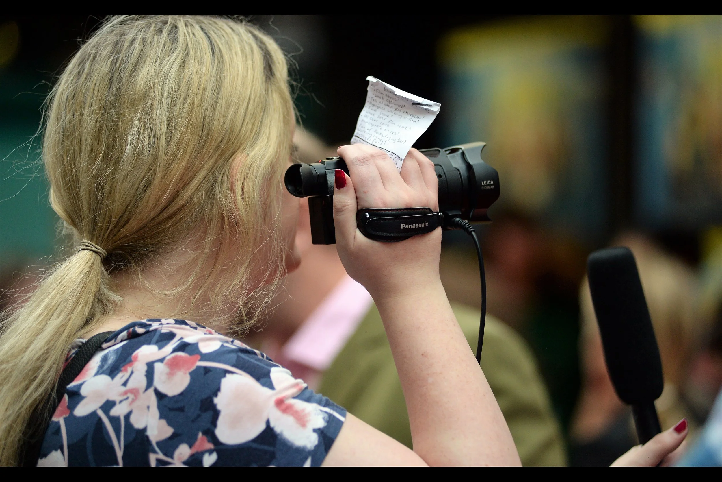 “One hand for the camera, one hand for the mic. One eye for the questions, one eye for the composition.” - and I thought dualwielding cameras was challenging!