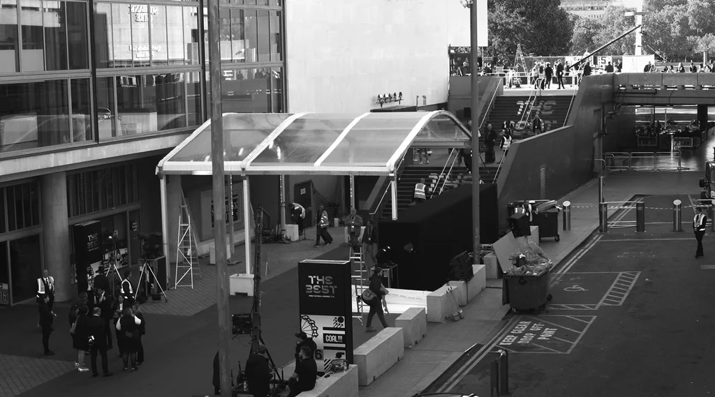 If you ever wanted to make sure nobody had a chance of photographing into your paparazzi photographer cordon/pen, this is pretty much how you’d do it. Robotic sentry guns sold separately.