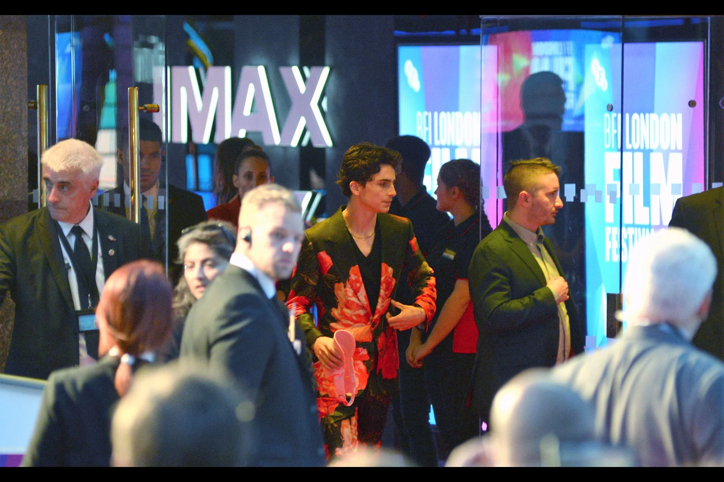 To the sounds of lustful cheers (and possibly the furious scratching of fashion designers sketching the design on his jacket) Timothee Chalamet exits the cinema.