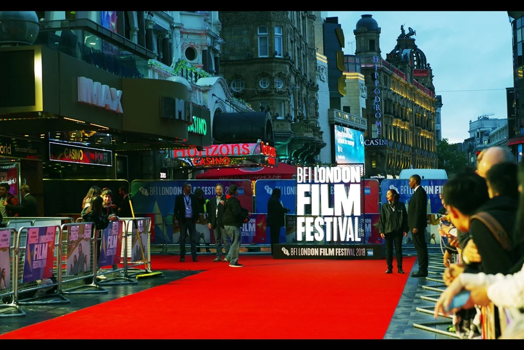 I’m back on the red carpet, the number of autograph dealers around me was slightly less than yesterday, and pleasingly I’m not feeling the same sense of musical dread coming from the speakers as the day before. It’s raining, though. There is that.
