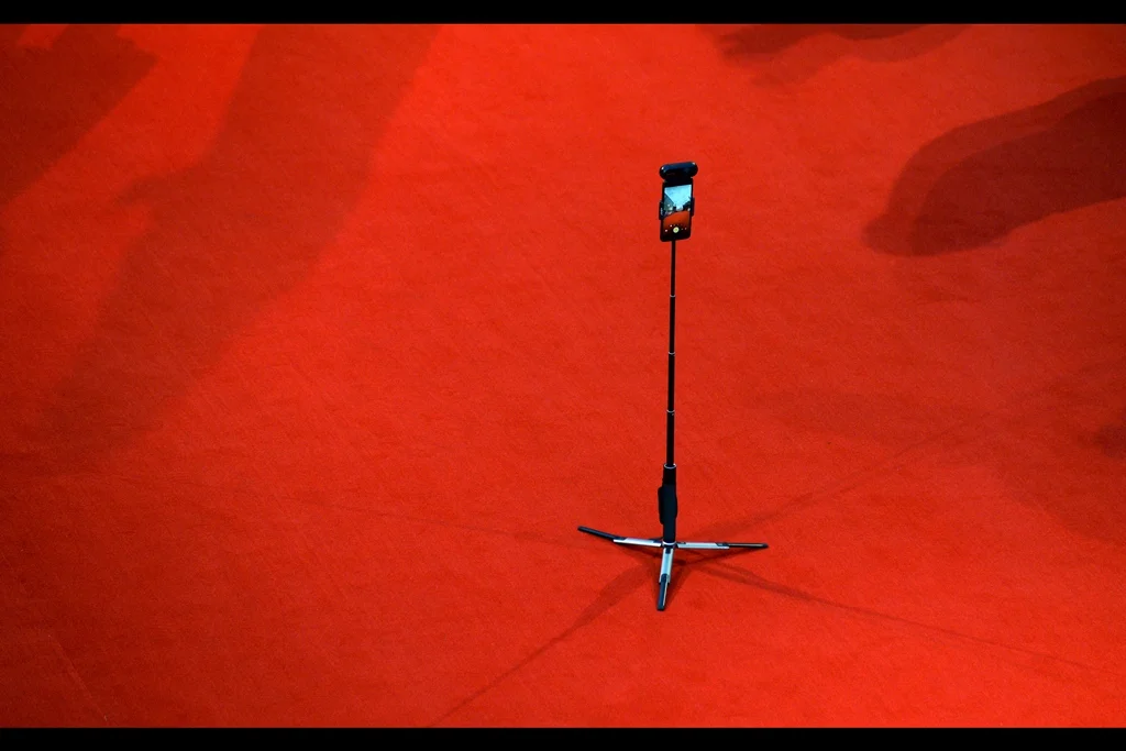 I don’t know. Walk into a public pen at a premiere these days and you’re likely to get a bag search, metal detectors scrutiny from a sniffer dog and the demand to take a sip of any liquid you take with you. Leave something looking like a mobile artificial intelligence platform of unknown menace and designs on the carpet itself and nobody seems to bother.