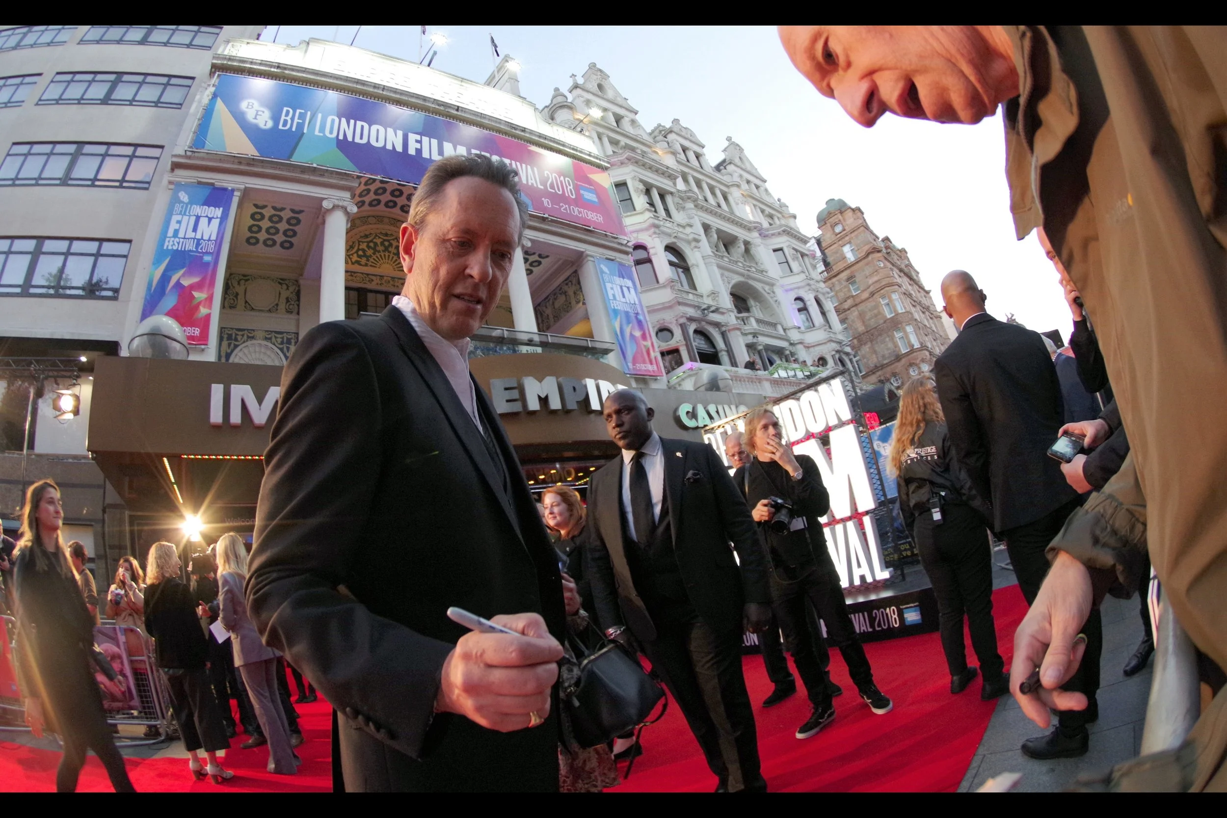 “That’s a cool picture. I’m not entirely sure it’s me… but it’s definitely cool. So I'mma sign it”